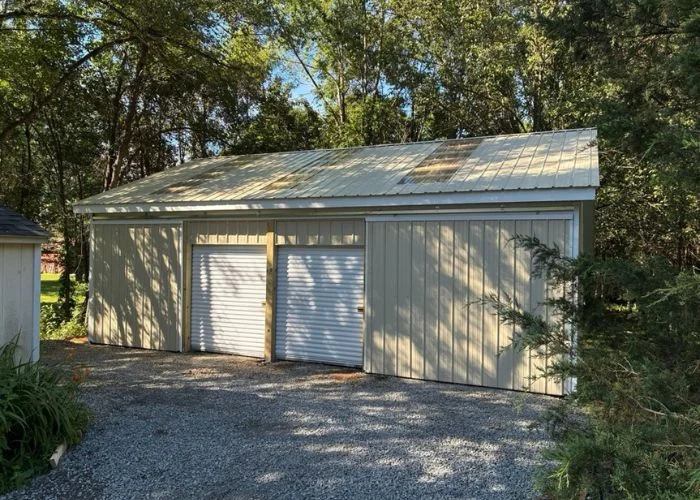 yellow barn and shed construction