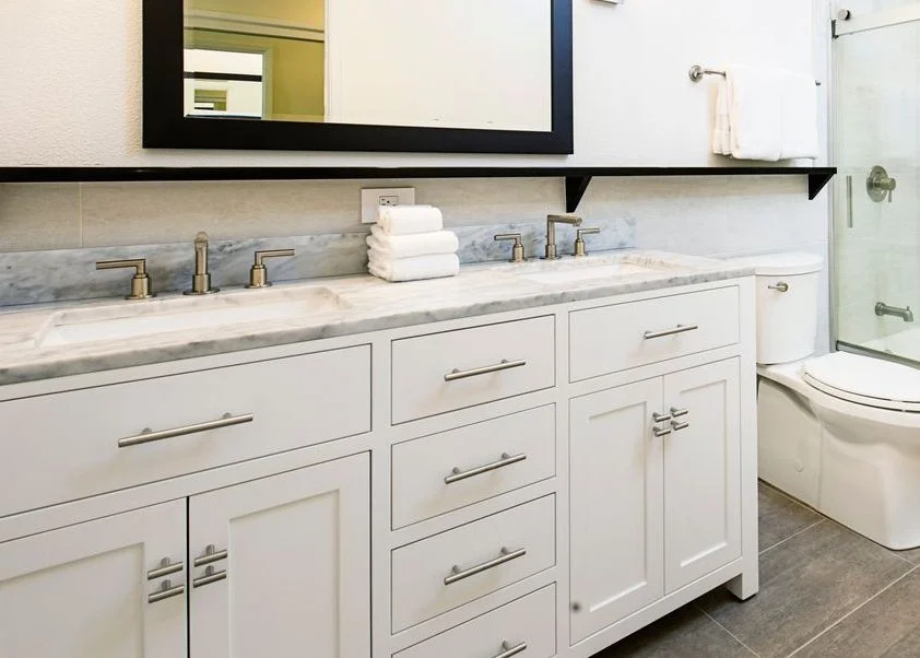 new bathroom vanity in hall bath with double sink and plenty of storage