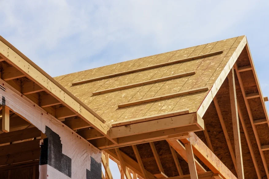 a new roof being built for a home addition